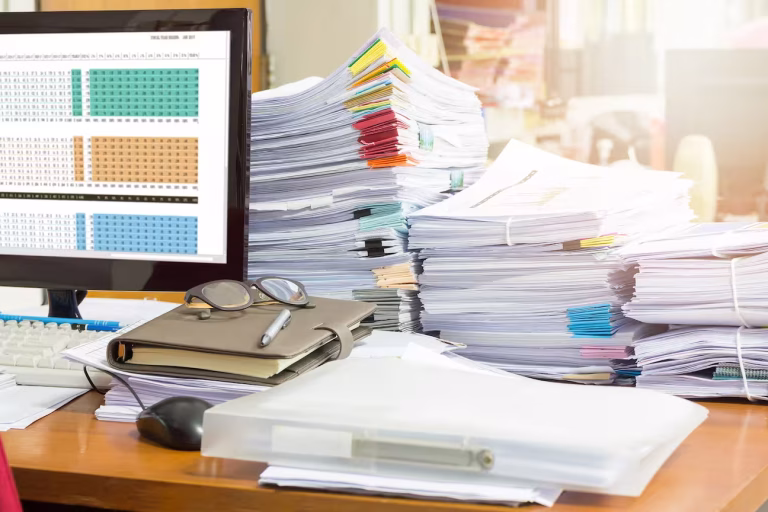 Pile of unfinished documents on office desk, Stack of business paper